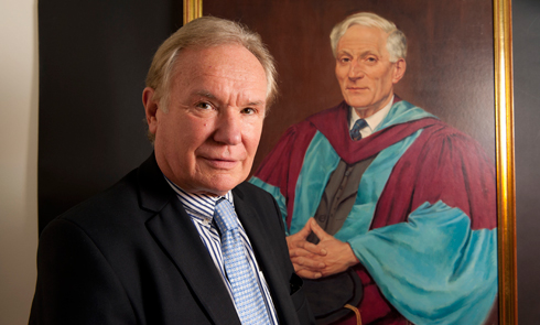 Prof Sir David Payne, Director, with portrait of Prof Eric Zepler